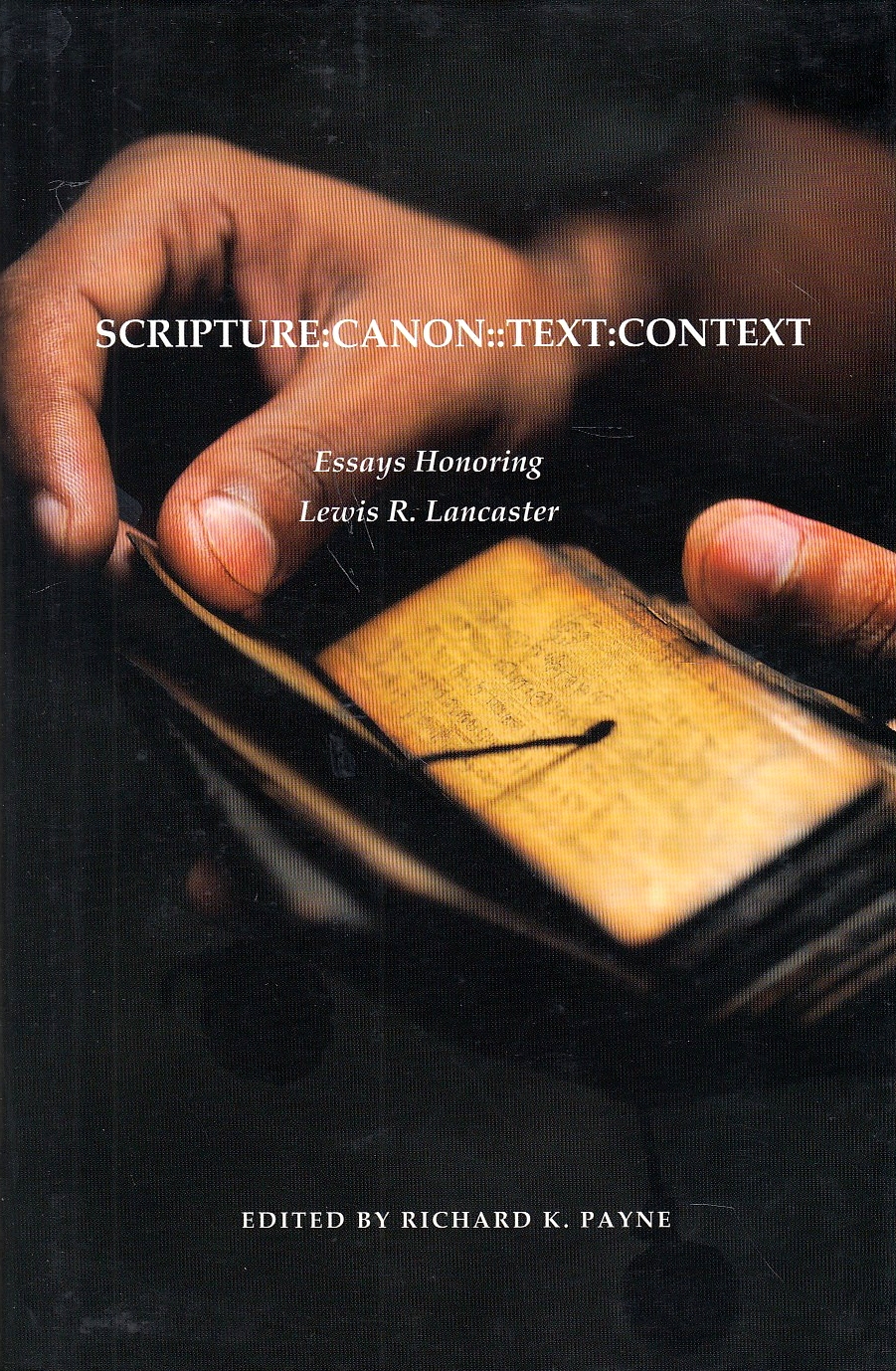 Scripture:Canon::Text:Context : essays honoring Lewis Lancaster